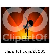 Sexy Black Silhouetted Pole Dancer Woman On A Stage Under Orange And Red Spotlights