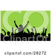 Clipart Illustration Of A Silhouetted Crowd Waving Their Hands In The Air At A Music Concert Over A Green Background