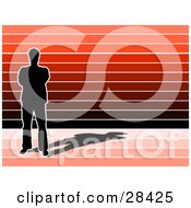 Clipart Illustration Of A Black Silhouetted Man With A Shadow Standing Over A Red And Black Striped Background