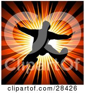 Clipart Illustration Of A Black Silhouetted Man Holding His Arms Out And Jumping Over A Bursting Red Background by KJ Pargeter