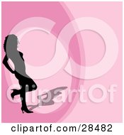 Poster, Art Print Of Black Silhouetted Woman In Heels Standing On A Pink Background With A Circle
