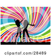 Two Black Silhouetted Women Dancing Together Over A Spiraling Rainbow Background