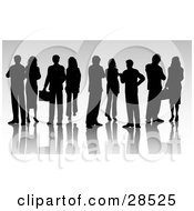 Clipart Illustration Of A Group Of Black Silhouetted Businessmen And Businesswomen by KJ Pargeter