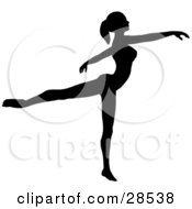Clipart Illustration Of A Silhouetted Ballerina Standing On Her Toes With Her Arms Out Gracefully