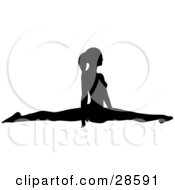 Black Silhouetted Female Gymnast Doing The Splits