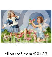 Poster, Art Print Of Vintage Valentine Of A Surprised Little Girl Leaning Back While Cupid Kneels Before Her Offering Her Flowers In A Garden Circa 1905