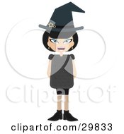 Laughing Evil Blue Eyed Black Haired Female Witch With Stars On Her Hat Holding Her Arms Behind Her Back