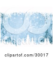 Blue Grunge Background With Splatters Bordered By White Snowflakes And Tree Tops