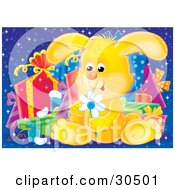 Cute Yellow Baby Bunny Rabbit Sitting In Front Of A Group Of Presents Picking Petals Off Of A Yellow Daisy Flower