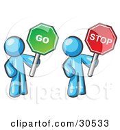 Light Blue Men Holding Red And Green Stop And Go Signs