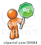 Poster, Art Print Of Orange Man Holding Up A Green Go Sign On A White Background