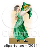 Vintage Victorian St Patricks Day Scene Of A Patriotic Young Irish Lady Wearing A Green Dress Holding An Irish Flag Circa 1907