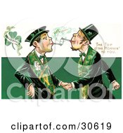 Vintage Victorian St Patricks Day Scene Of Two Friendly Irish Men Dressed In Green Touching Tobacco Pipes And Shaking Hands Circa 1910