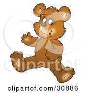 Happy Bear Cub Seated On The Floor