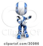 Blue Ao-Maru Robot Standing With His Arms Out To The Right And Looking Forward At The Viewer