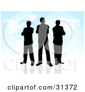 Poster, Art Print Of Group Of Black Silhouetted Businessmen Standing On A Reflective Surface With A Blue Map Background