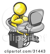 Poster, Art Print Of Yellow Man Working On A Desktop Computer On A Table