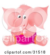 Pink Elephant In Pink Shorts Sitting On The Ground And Giggling On A White Background
