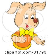 Clipart Illustration Of A Beige Puppy Dog In An Orange And Yellow Shirt With A Bow Gesturing With Its Paws