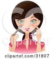 Poster, Art Print Of Beautiful Brunette Caucasian Woman With Green Eyes Facing Front And Applying Blush To Her Cheeks