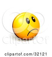 Expressive Yellow Smiley Face Emoticon Looking Off To The Right And Frowning Or Pouting