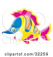 Poster, Art Print Of Blue White Orange And Yellow Fish With Purple Fins And Green Eyes Smiling While Swimming Past