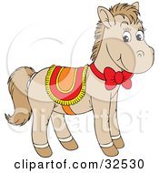 Clipart Illustration Of A Cute Beige Pony Wearing A Red Yellow And Orange Saddle And Bow by Alex Bannykh