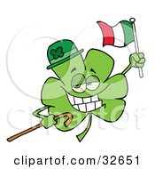 Clipart Illustration Of A Clover Character Wearing A Green Hat Holding A Cane And A Flag While Celebrating St Patricks Day
