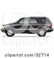 Black Chevy Blazer In Profile With Dark Window Tint