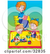 Poster, Art Print Of Mother Reading A Book On A Bench While Her Children Play In A Sand Box At A Park