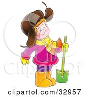 Poster, Art Print Of Happy Girl In A Purple Coat Standing With A Shovel