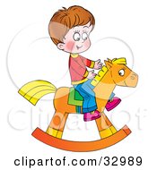 Happy Boy Riding On A Rocking Horse