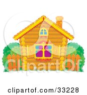 Small Log Home With Diamond Shutters A Wooden Fence And Bushes In The Yard