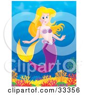 Blond Mermaid With A Purple Wearing Purple Shells Swimming Above A Coral Reef In The Sea