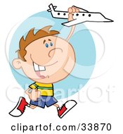 Poster, Art Print Of Little Boy Having Fun Smiling And Running With A Toy Airplane