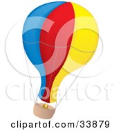 Blue Red And Yellow Air Balloon With A Basket Flying Through The Air