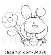 Clipart Illustration Of A Black And White Outline Of A Happy Bunny Rabbit Sitting With A Daisy Flower