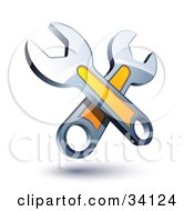 Clipart Illustration Of Two Crossed Yellow And Chrome Wrenches by beboy