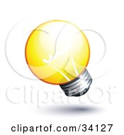 Poster, Art Print Of Short And Round Yellow Lightbulb Shining Brightly