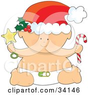 Christmas Baby In A Santa Hat And Diaper Holding A Star Rattle And A Candy Cane