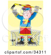 Poster, Art Print Of Male Hockey Goalie Preparing To Block A Puck