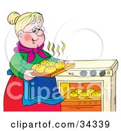 Sweet Blond Granny Taking Hot Rolls Out Of An Oven