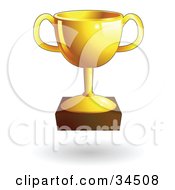 Clipart Illustration Of A Shiny Gold Trophy Cup by AtStockIllustration