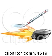 Clipart Illustration Of A Hockey Stick Hitting A Flaming Hockey Puck by AtStockIllustration