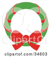 Poster, Art Print Of Green Christmas Wreath With A Red Bow And Ribbon