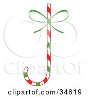 Clipart Illustration Of An Upside Down Green Red And White Striped Candy Cane With A Green Bow