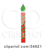 Clipart Illustration Of A Red And Green Striped Christmas Candle With A Green Flame by OnFocusMedia