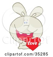 Poster, Art Print Of Caring Beige Rabbit Laughing And Holding A Red Heart Love Valentine