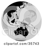 Clipart Illustration Of A Gray And Black Globe Featuring The Australian Continent by dero