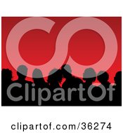 Clipart Illustration Of A Black Silhouetted Crowd Of Men And Women Against Red